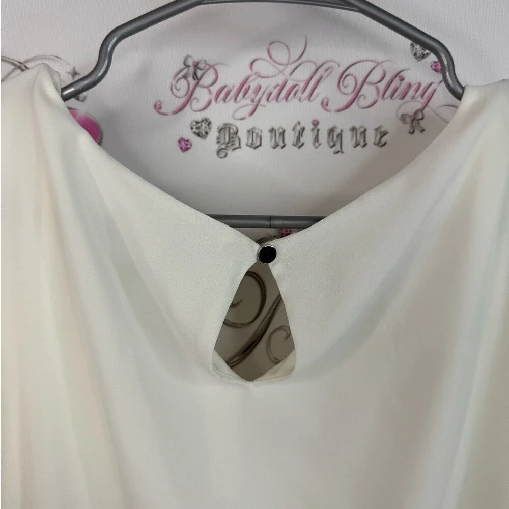 Laura top blouse flower design Elegant Floral Blouse with Artistic Design